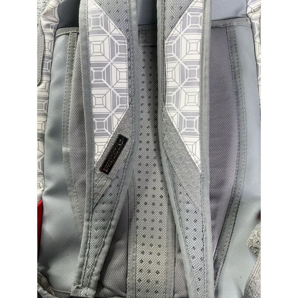 Sprayground A.I. African Intelligence DBX Sandflower Hiking Backpack Gray Pink